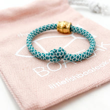 simple knot-teal
