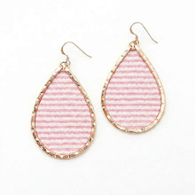 Teardrop-shaped earrings with pink striped design and gold accents on a white background