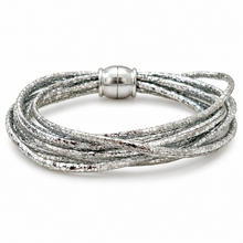 A multi-strand silver wrap bracelet with a textured, hammered finish and a polished silver magnetic clasp, shown on a clean white background.