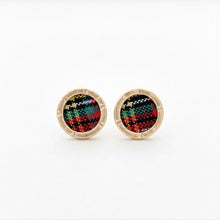 Round earrings with colorful pattern on a white background