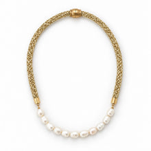 A gold mesh chain necklace with a curved section of white baroque pearls at the bottom, displayed on a clean white background.