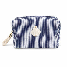 Blue and white striped pouch with a shell decoration on a white background