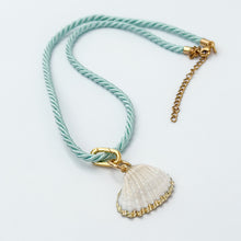 aqua silk cord with white gold edged shell pendant