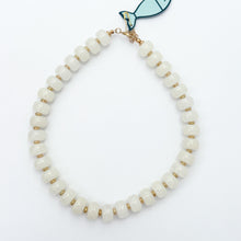 cream acrylic large barrell beaded and knotted necklace