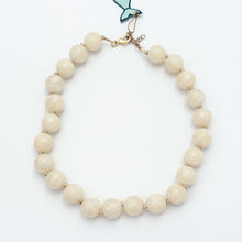 cream acrylic large beaded and knotted necklace