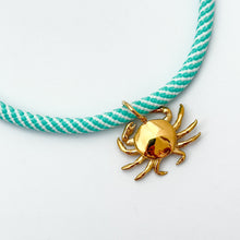 aqua and white stripe rope necklace with crab shell