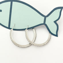 silver tennis hoops