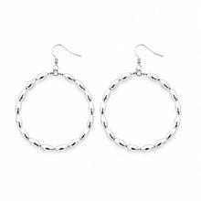 Large silver-tone rice-bead hoop earrings with hooks on white.