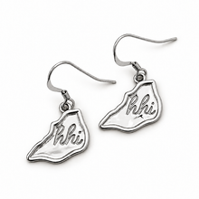 Silver-tone hhi island charm earrings with ear hooks on white.