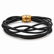 A multi-strand black woven cord bracelet with a polished gold cylindrical clasp, displayed on a clean white background.