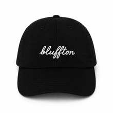 Black cap with 'bluffton' embroidered on a white background