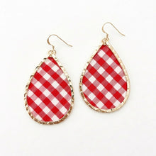Red and white checkered teardrop earrings with gold accents on a white background