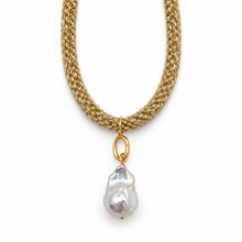A gold chain necklace featuring a woven textured pattern and a dangling baroque pearl pendant in a gold bezel setting, shown against a plain white background.