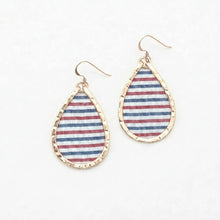 Teardrop-shaped earrings with striped design on a white background