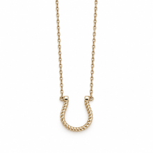 A gold necklace featuring a twisted rope-style horseshoe pendant on a delicate cable chain, shown against a plain white background.