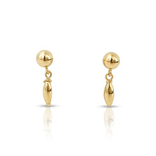 Pair of gold earrings on a white background