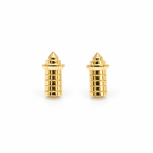 A pair of gold-toned pointed stud earrings with a ribbed textured cylindrical design, shown on a plain white background. HARBOUR TOWN LIGHTHOUSE