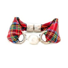 Plaid bow tie and collar set on a white background