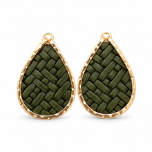 A pair of teardrop-shaped earrings with olive green woven leather inlays and textured gold-tone borders, shown on a plain white background.