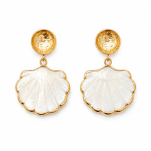 White scallop-shaped drop earrings with gold-tone rims and round textured posts.