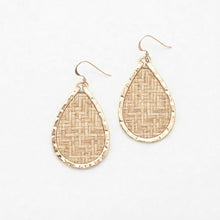 Pair of gold teardrop earrings with woven design on a white background