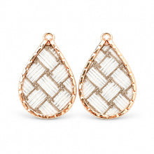 A pair of teardrop-shaped earrings with textured rose gold borders and white woven inlay, shown on a clean white background.