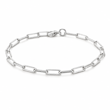 A silver paperclip chain bracelet with a lobster clasp, displayed in a circular shape on a clean white background.