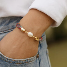 Harbour Town tartan nautical rope bracelet with freshwater pearl worn on wrist by little fish BOATEAK