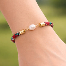 Harbour Town tartan nautical rope bracelet with freshwater pearl worn on wrist by little fish BOATEAK
