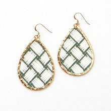 Teardrop-shaped earrings with green and gold pattern on a white background