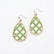 Teardrop-shaped earrings with green and white plaid pattern on a light background