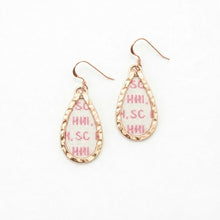 Teardrop-shaped earrings with pink and white pattern on a white background