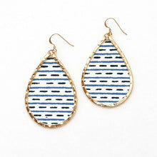 Teardrop-shaped earrings with blue and black pattern on a white background